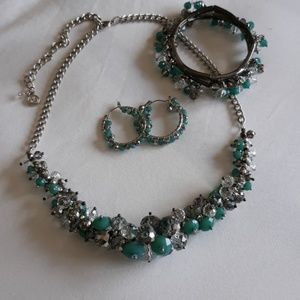 Necklace, bracelet and earrings